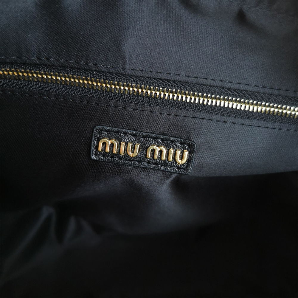 Matelasse nappa leather top-handle bag