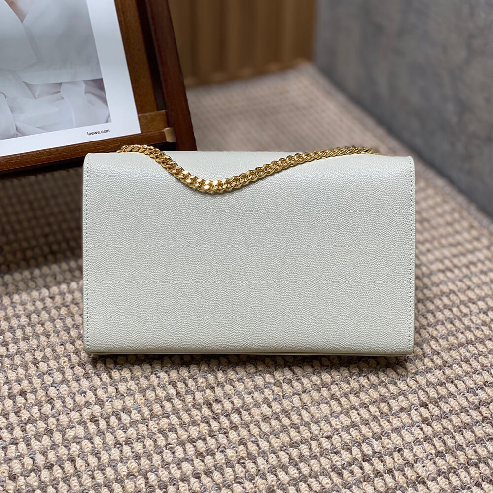 Y51 kate medium tassel in grain de poudre embossed leather