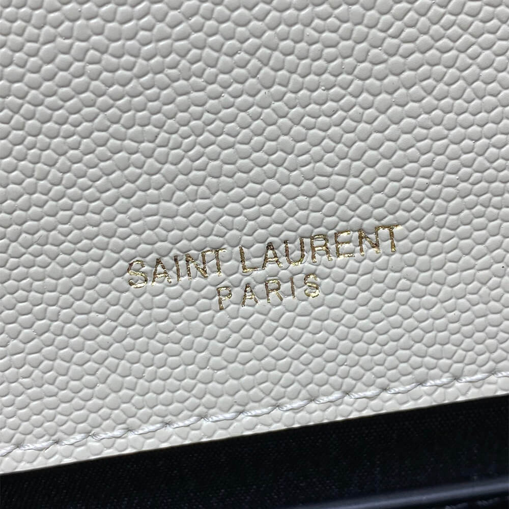Y51 kate medium tassel in grain de poudre embossed leather